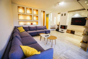 Luxurious 4BDR Retreat with cozy Fireplace